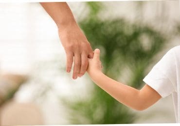 holding hand child support look after children with serious allergies